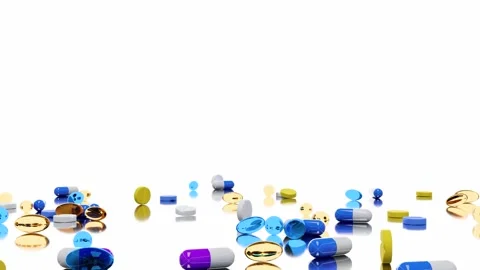 Medications fall onto the surface and bounce off in an irregular manner. Is.. Stock Footage 246070546