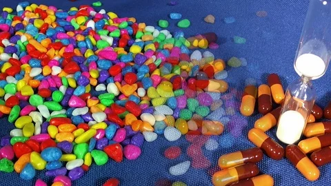 Medicinal capsules that fall Stock Footage 111071837