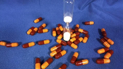 Medicinal capsules that fall Stock Footage 111196784