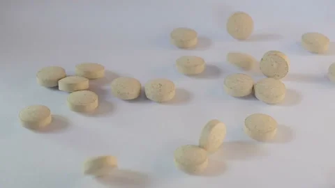 Medicinal Pills Falling On The Table Stock Footage 88995216