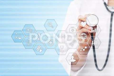 Medicine and healthcare concept. Medical doctor working with modern pc Stock Photos