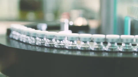 Medicine bottles in pharmaceutical factory Stock Footage
