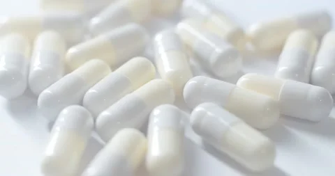 Medicine in capsules rotate Stock Footage 166651972