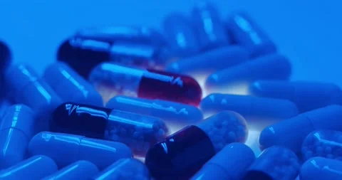 Medicine in capsules rotate Stock Footage 166652951