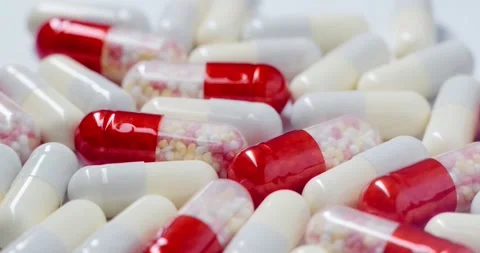 Medicine in capsules rotate Stock Footage 166653428