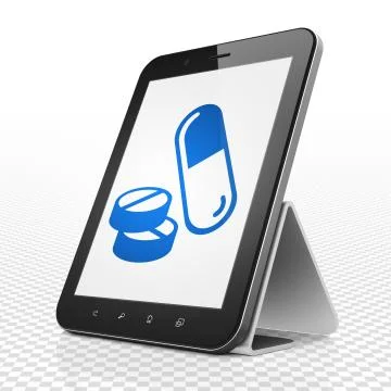 Medicine concept: Tablet Computer with Pills on display Stock-Illustration