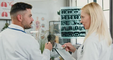 Medicine concept where good-looking smart qualified adult male and female medics Stock Footage 160430418