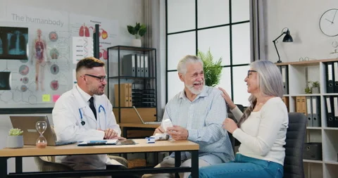 Medicine concept where good-looking positive experienced bearded doctor smiling Stock Footage 160842386