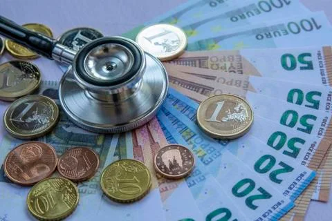 Medicine cost - Stethoscope over a stack of euros Stock Photos