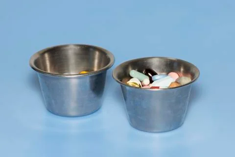 Medicine cups Stock Photos