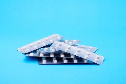 Medicine with packaging On a blue background table, medications, vitamins, .. Stock Photos