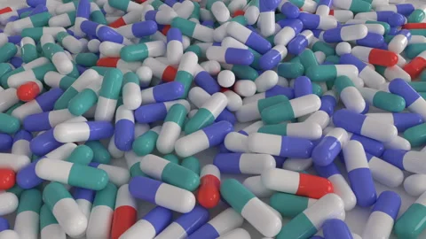 Medicine pill capsule falling down animation. Stock Footage 130721687