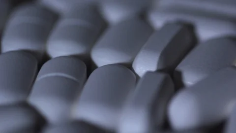 Medicine pills in macro Stock Footage 121233166