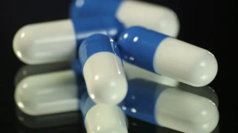 Medicine pills rotating close up Stock Footage 33818148
