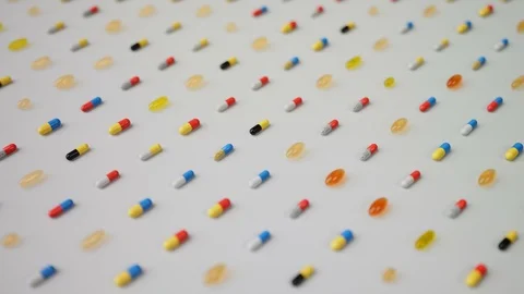 Medicine various Capsules sorted angular view Stock Footage 87732799