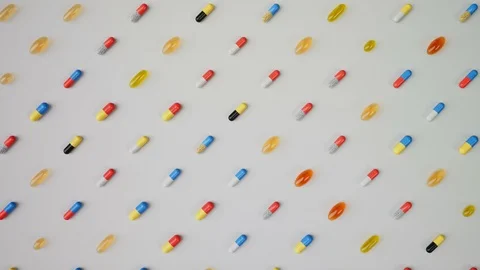 Medicine various Capsules sorted top view Stock Footage 87732801