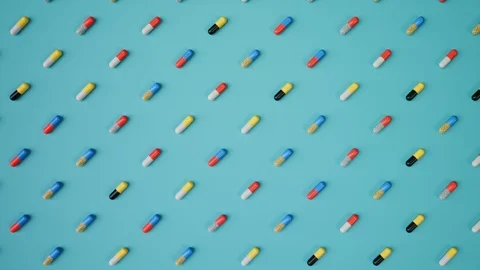 Medicine various Capsules sorted top view color background Stock Footage 87732887