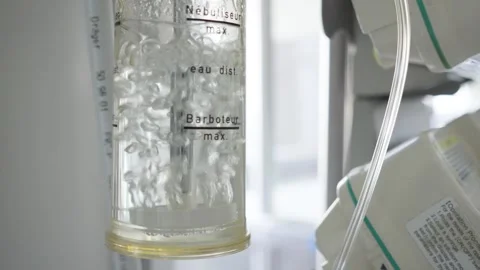 Medicine, view of a regulator Oxygen Flow Meter of a oxygen system, glassy tank Stock Footage 311055886