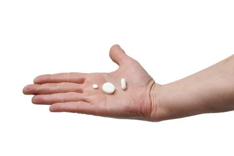 Medicines in a hand Stock Photos