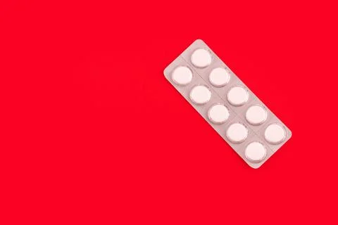 Medicines in packaging on a red background. Flatlay. women's health, treatm.. Stock Photos