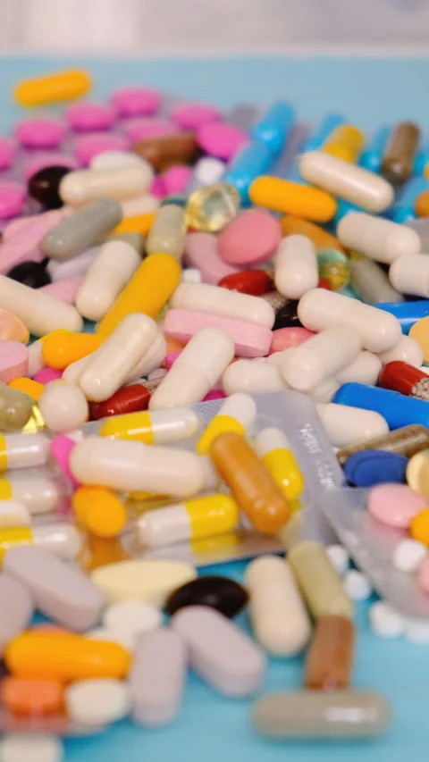 Medicines tablets and capsules. Selective focus. Stock Footage 307682784