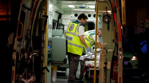 Medics in Back of Ambulance Stock Footage 33137379