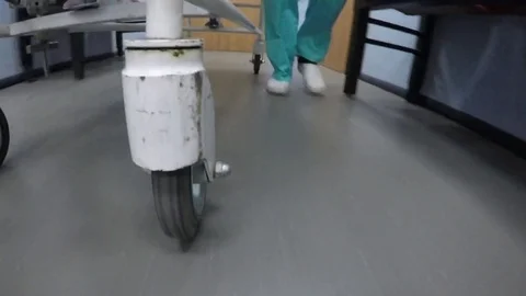 Medics pull the stretchers with sick patient Stockbeeldmateriaal 79554335
