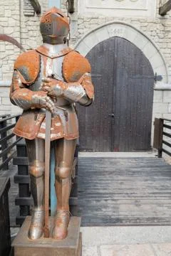 Medieval armor in front of a castle. Stock Photos