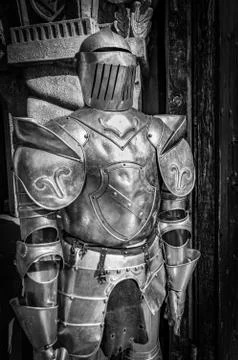 Medieval armor in front of a castle. Stock Photos