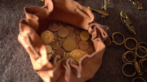 Medieval authentic leather wallet bag with gold coins. Historical jewelry. Money Stock Footage 168462483