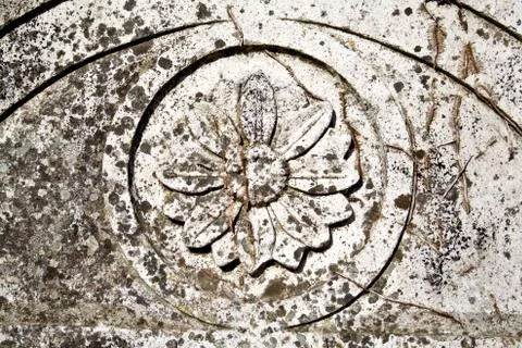 Medieval bas-relief of a flower Stock Photos