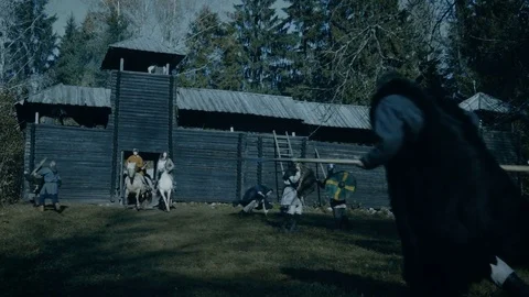 Medieval Battle Where Vikings Attack Wooder Fortress, Villagers Defend and Fight Stock Footage 82854536