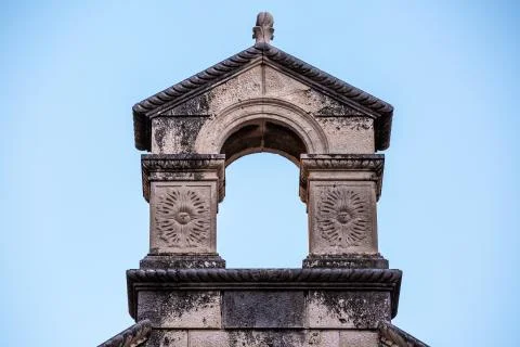 Medieval bell tower dilapidated arched gray top in Mali Ston Stock Photos