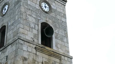 Medieval bell tower with singing bell motion and old clock,historical monument Vídeos de archivo 138606902