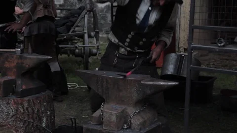 Medieval blacksmith - metalsmith Stock Footage 90139100