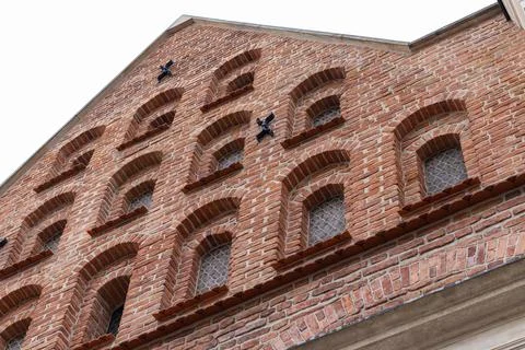 Medieval Brick Facade with Arched Windows Stock Photos