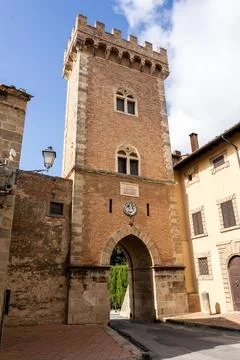 Medieval brick gate tower with arched passage Stock Photos