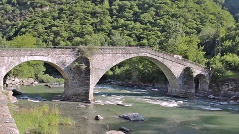 The medieval  bridge of Echallod in Arnad,  in Aosta Valley/Italy. Stock Footage 113872980