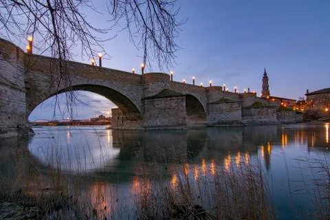 Medieval bridge over Ebro river in Zaragoza, Spain Stock Photos