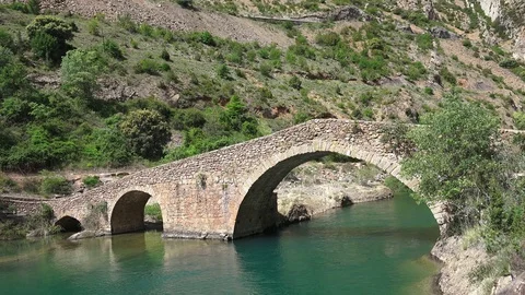 Medieval bridge over a river Stock Footage 116418158