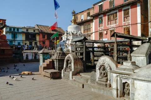 Medieval buildings and structures surrounding Swayambhunath stupa in the te.. Stock Photos