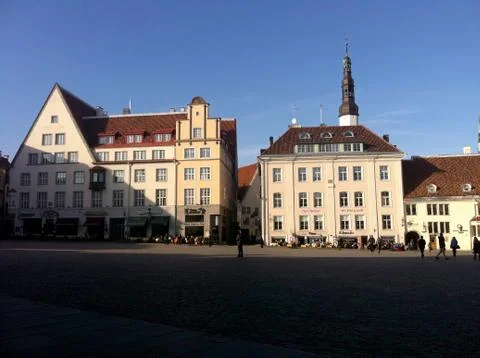 Medieval buildings in the square in shadow 写真素材