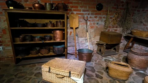 Medieval castle kitchen pantry with antique copperware Stock-Footage 322664434