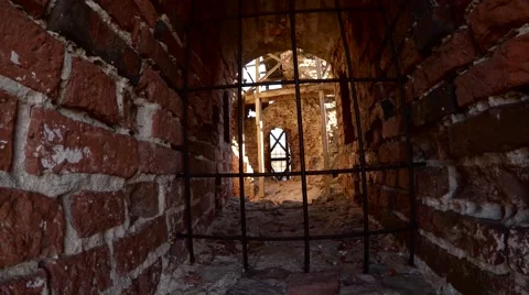 Medieval castle window with gridiron in sunny day Stock Footage 47014516