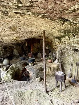 Medieval cave kitchen interior view Stock Photos