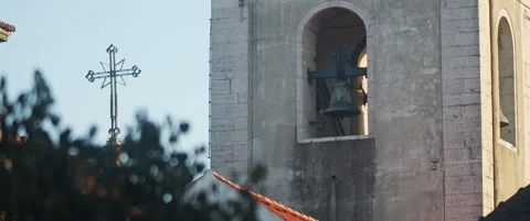 Medieval clock tower with bell and cross Stock Footage 151395141