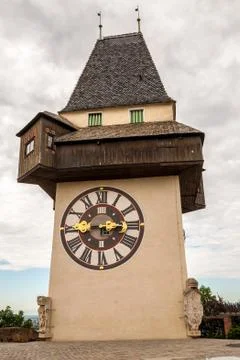 The medieval Clock tower Uhrturm is a symbol of Graz, Austria Stock Photos