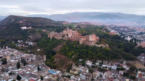 The medieval complex of Alhambra. Flying around Granada at sunrise, Spain. Stock Footage 165121228