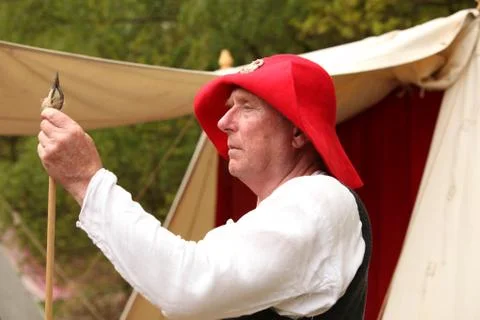 Medieval craftsman making an arrow Stock Photos