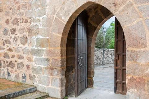 Medieval double-leaf door in Gothic style. Spain Stock Photos